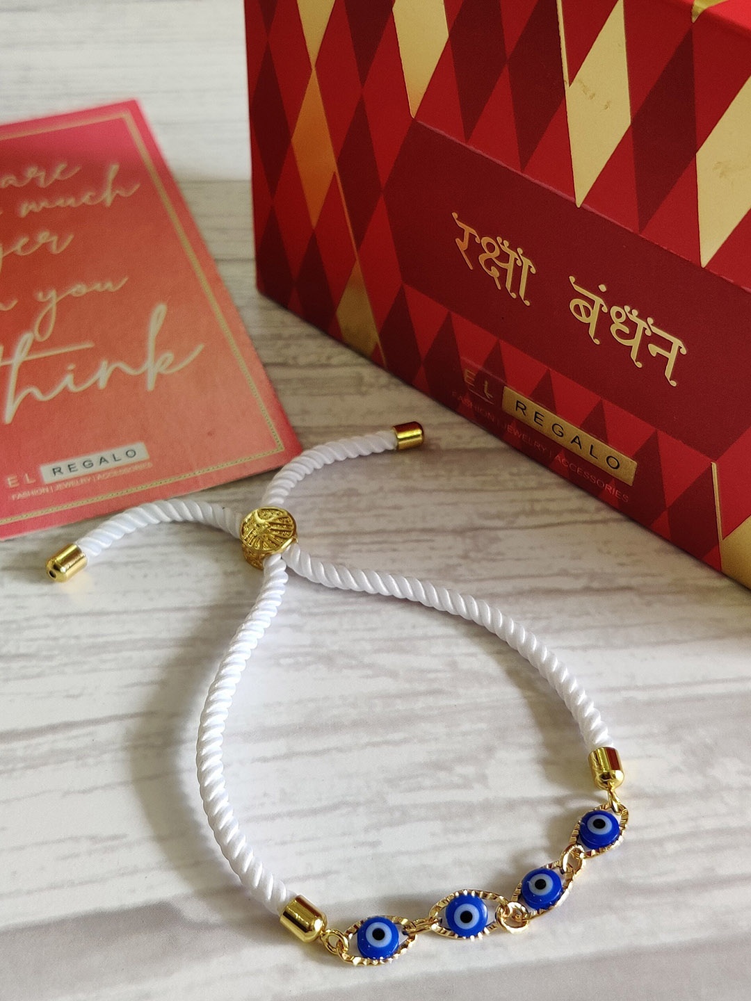 

EL REGALO White & Gold-Toned Evil Eye Stone-Studded Rakhi Gift Set