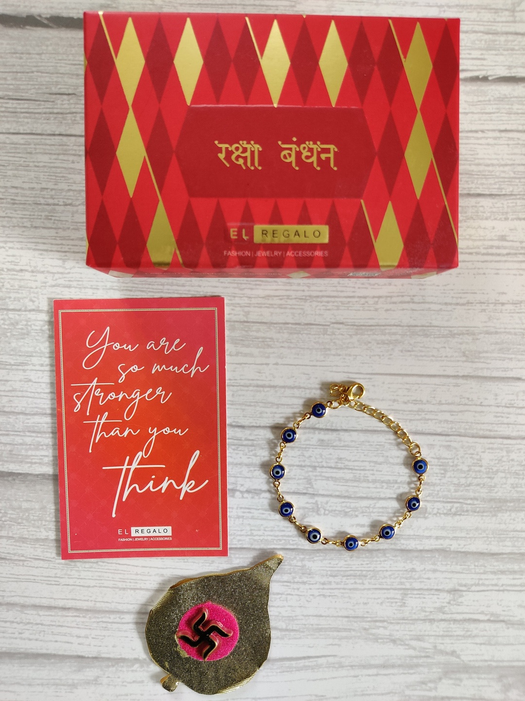 

EL REGALO Blue & Gold Toned Wraparound Rakhi