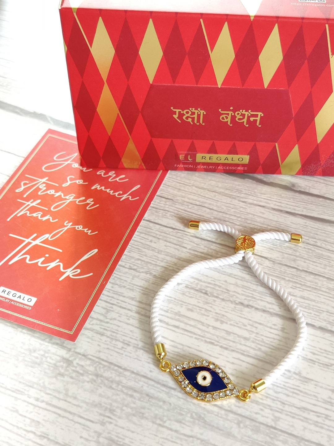 

EL REGALO Blue & Gold-Toned Evil Eye Stone-Studded Rakhi Gift Set
