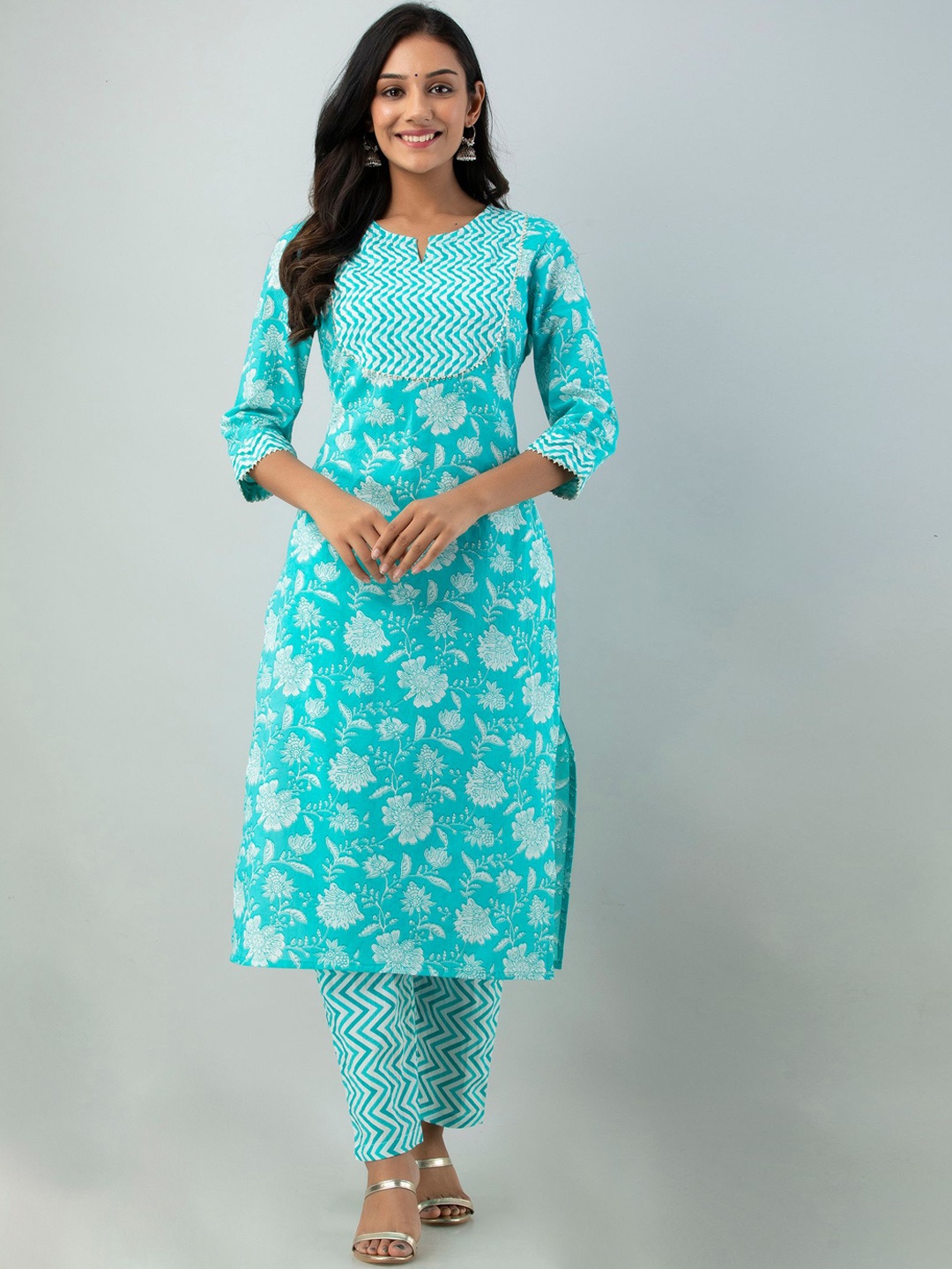 

Sutidora Women Turquoise Blue Floral Printed Pure Cotton Kurta with Trousers