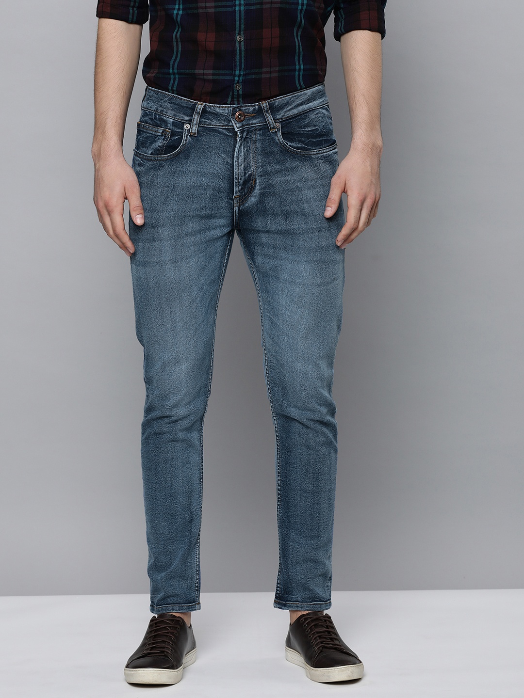 

Flying Machine Men Blue Tapered Fit Mid Rise Light Fade Stretchable Jeans