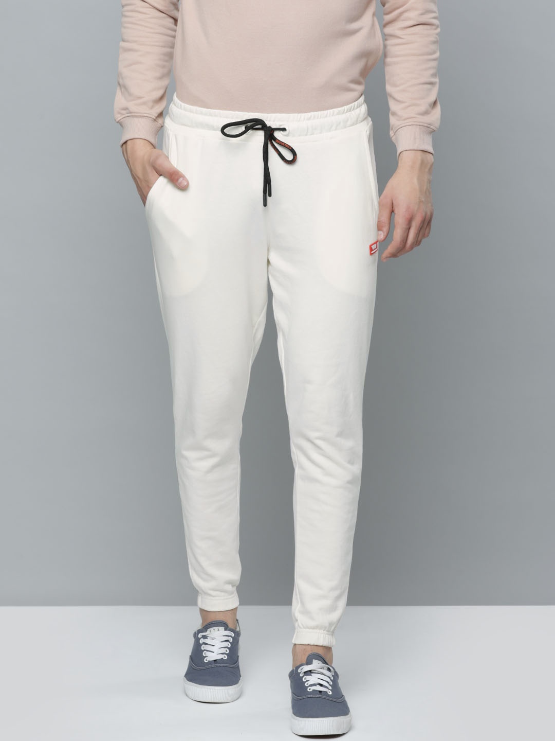 

Flying Machine Men Off White Solid Slim Fit Mid-Rise Knitted Joggers