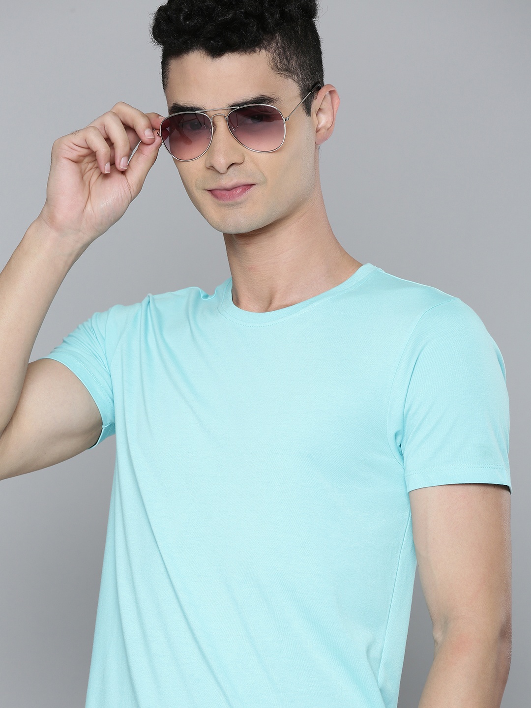 

Flying Machine Men Blue Solid Round Neck Knitted Indigo Slim Fit T-shirt