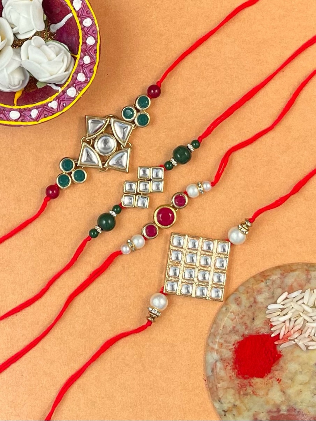 

KARATCART Men Gold-Plated & Gold-Toned Kundan-Studded Rakhi With RoliChawal