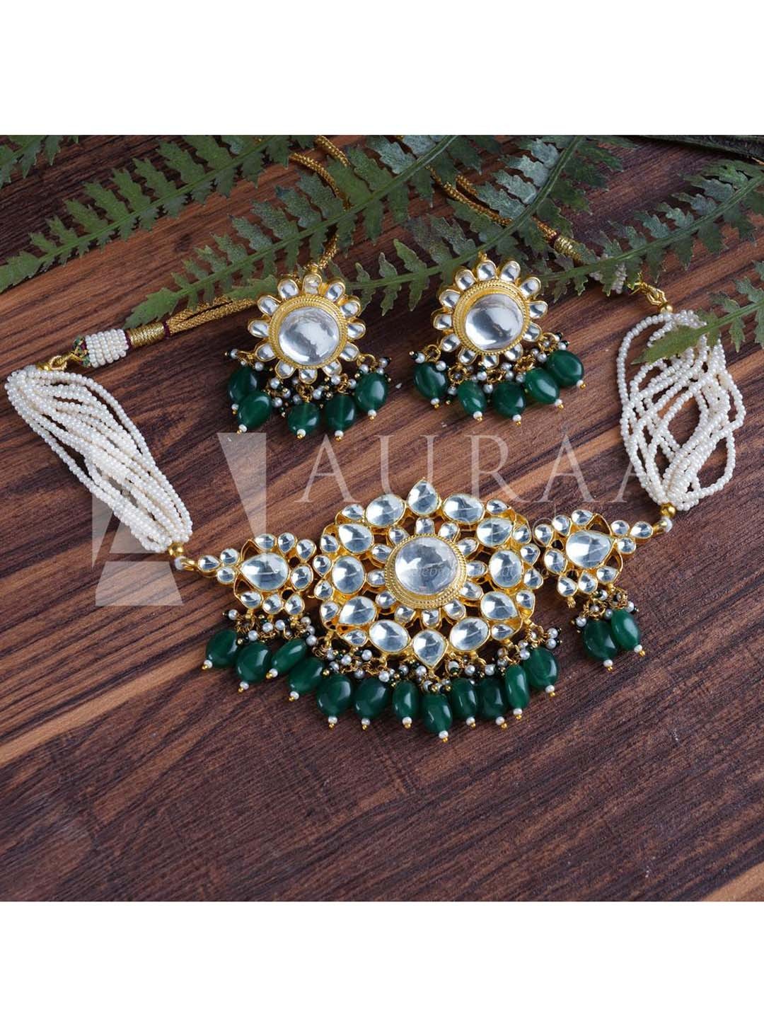 

AURAA TRENDS Women 22 KT Gold-Plated White & Green Kundan-Studded Jewellery Set