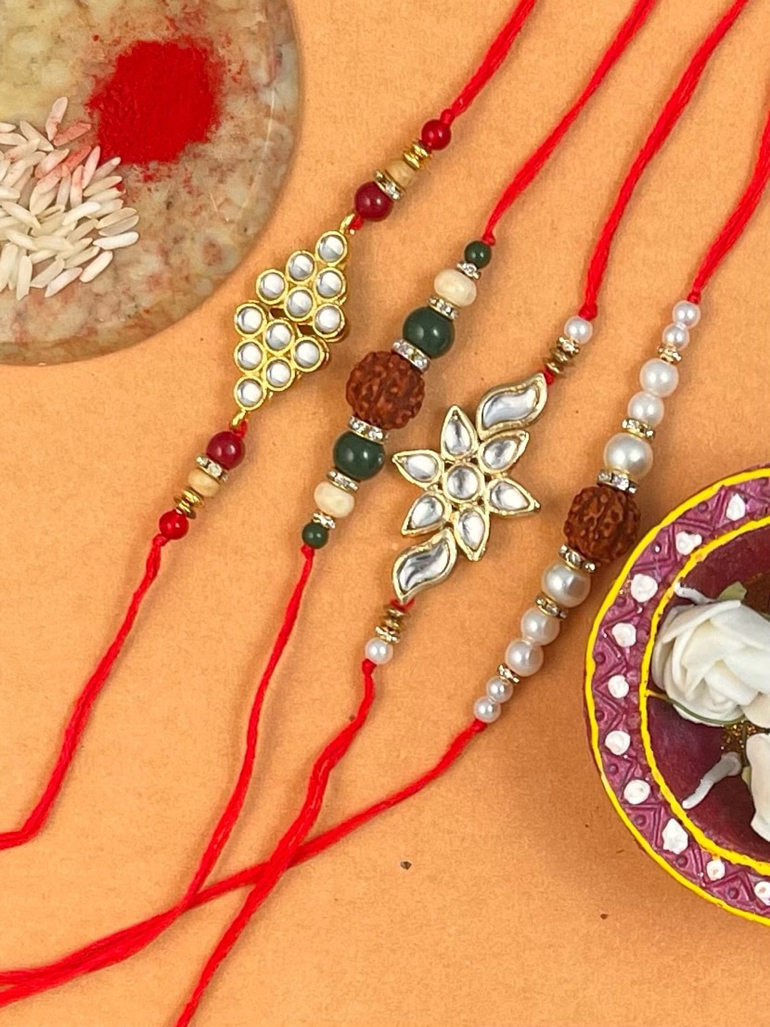 

KARATCART Men Set Of 4 Gold-Plated White & Green Kundan-Studded & Beaded Rakhi