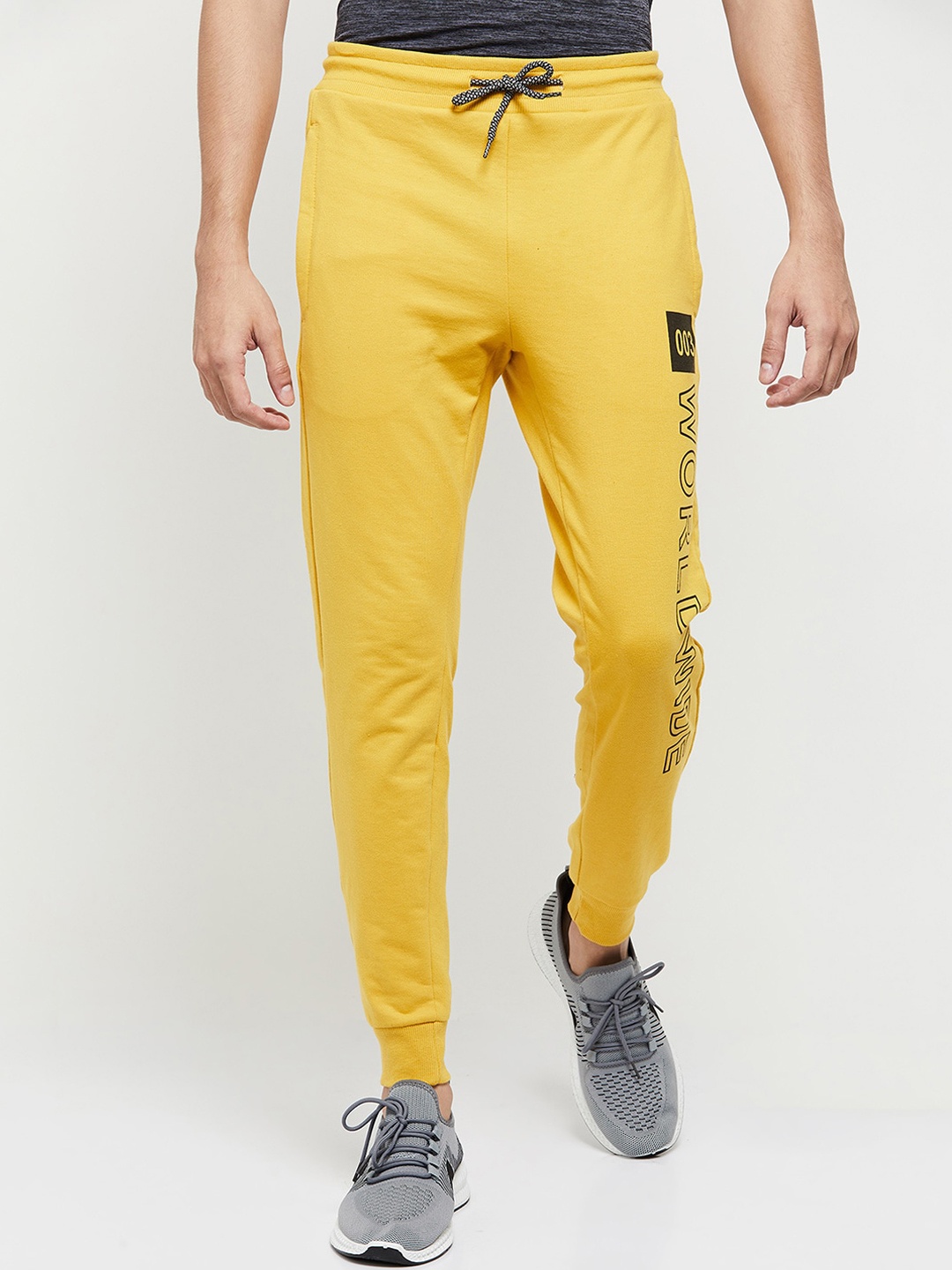 

max Men Mustard Solid Joggers