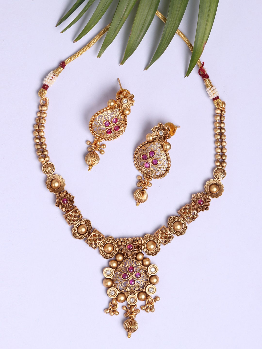 

JEWELS GEHNA Gold Plated Magenta Coloured Stone Studded Jewellery Set