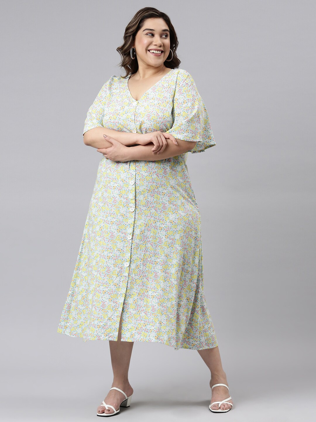 

The Pink Moon Plus Size Sea Green Floral A-Line with short bell sleeves Maxi Dress