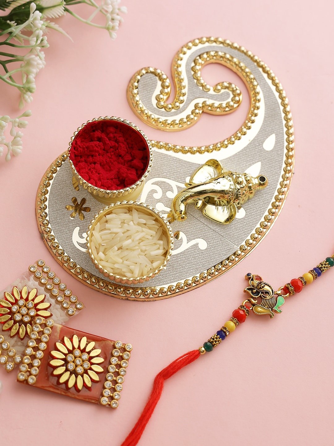 

Aapno Rajasthan Gold-Toned Bhaiya Rakhi With Pooja Thali