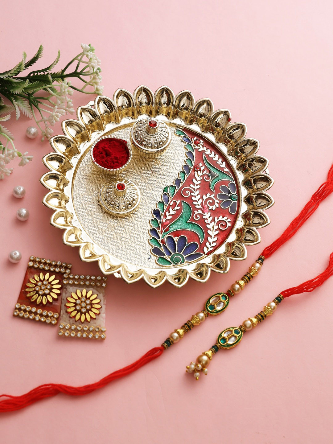 

Aapno Rajasthan Red & Gold-Toned Meenakari Bhaiya Bhabhi Rakhi Gift Set