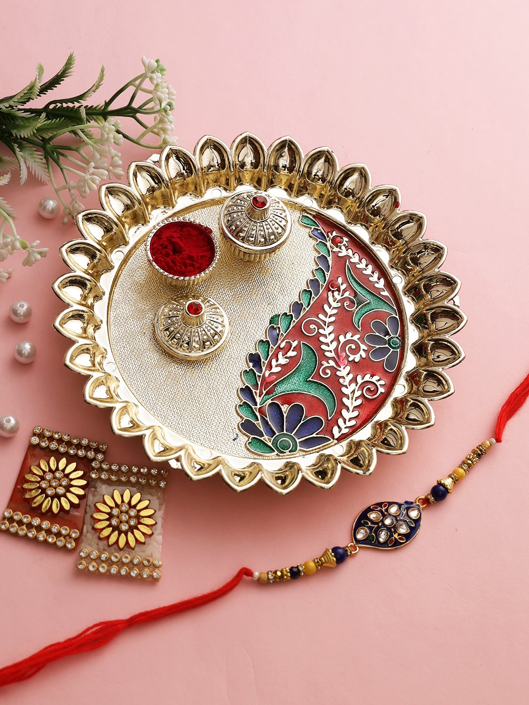 

Aapno Rajasthan Gold-Toned Bhaiya Rakhi with Meenakari Roli Chawal Thali