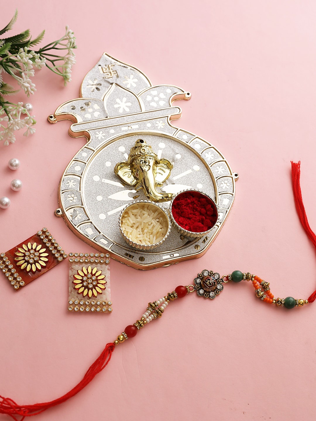 

Aapno Rajasthan Red Kalash Motif Stylish Shimmery Roli Chawal Thali with Bhaiya Rakhi