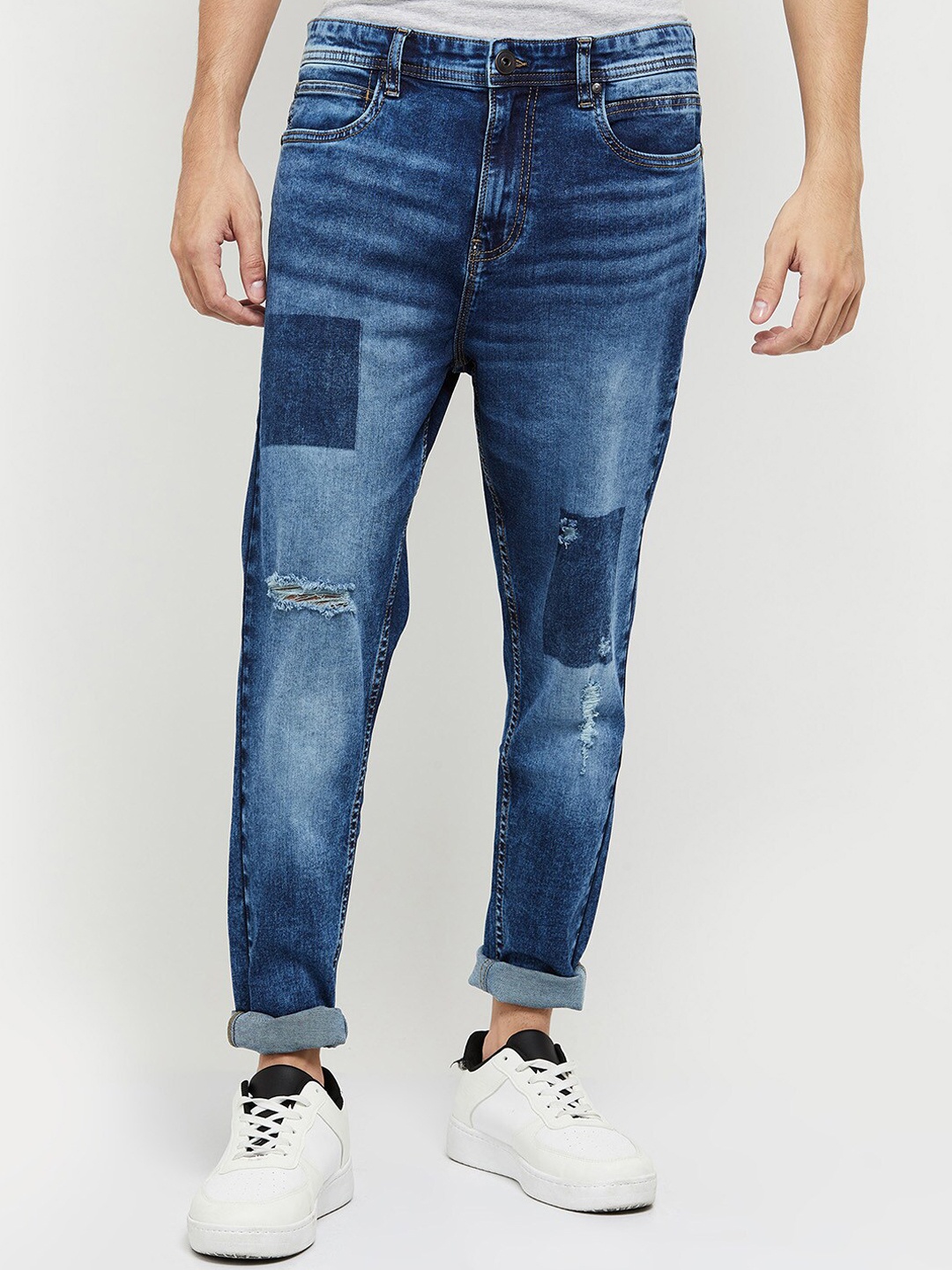 

max Men Blue Mildly Distressed Light Fade Patch Design Ripped Stretchable Jeans