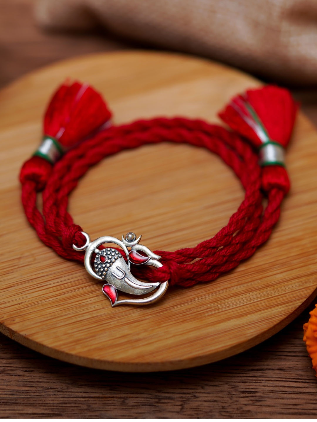 

Meenakari Heritage Jewellery Men Red 92.5 Sterling Silver Om Ganesha Rakhi
