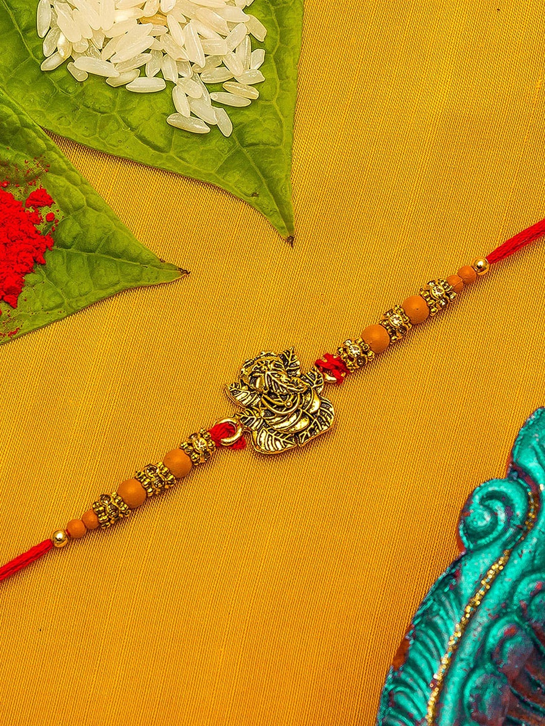 

aadita Men Red & Gold-Toned Beaded Rakhi