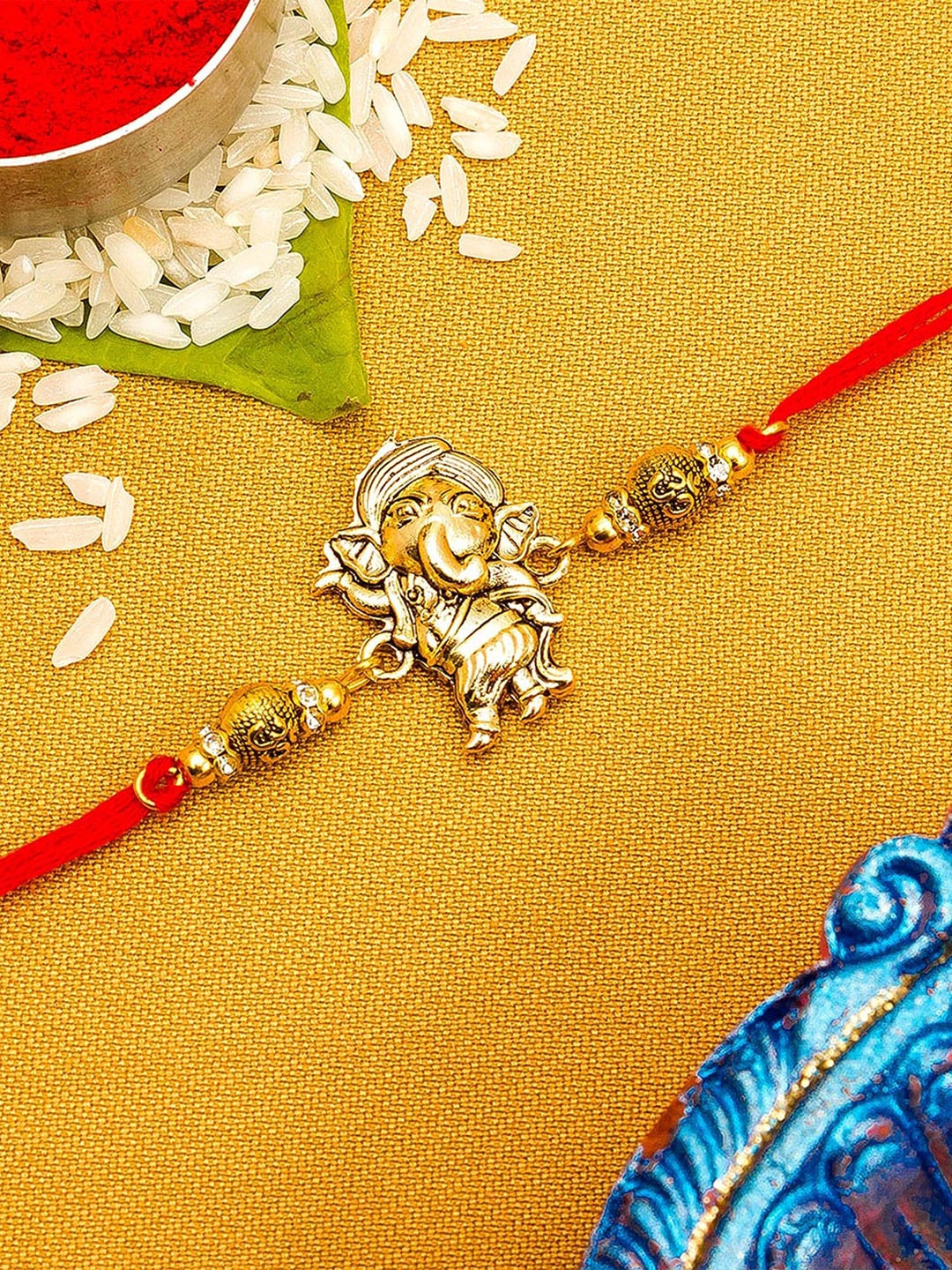

aadita Men Red & Gold-Toned Lord Ganesh Rakhi
