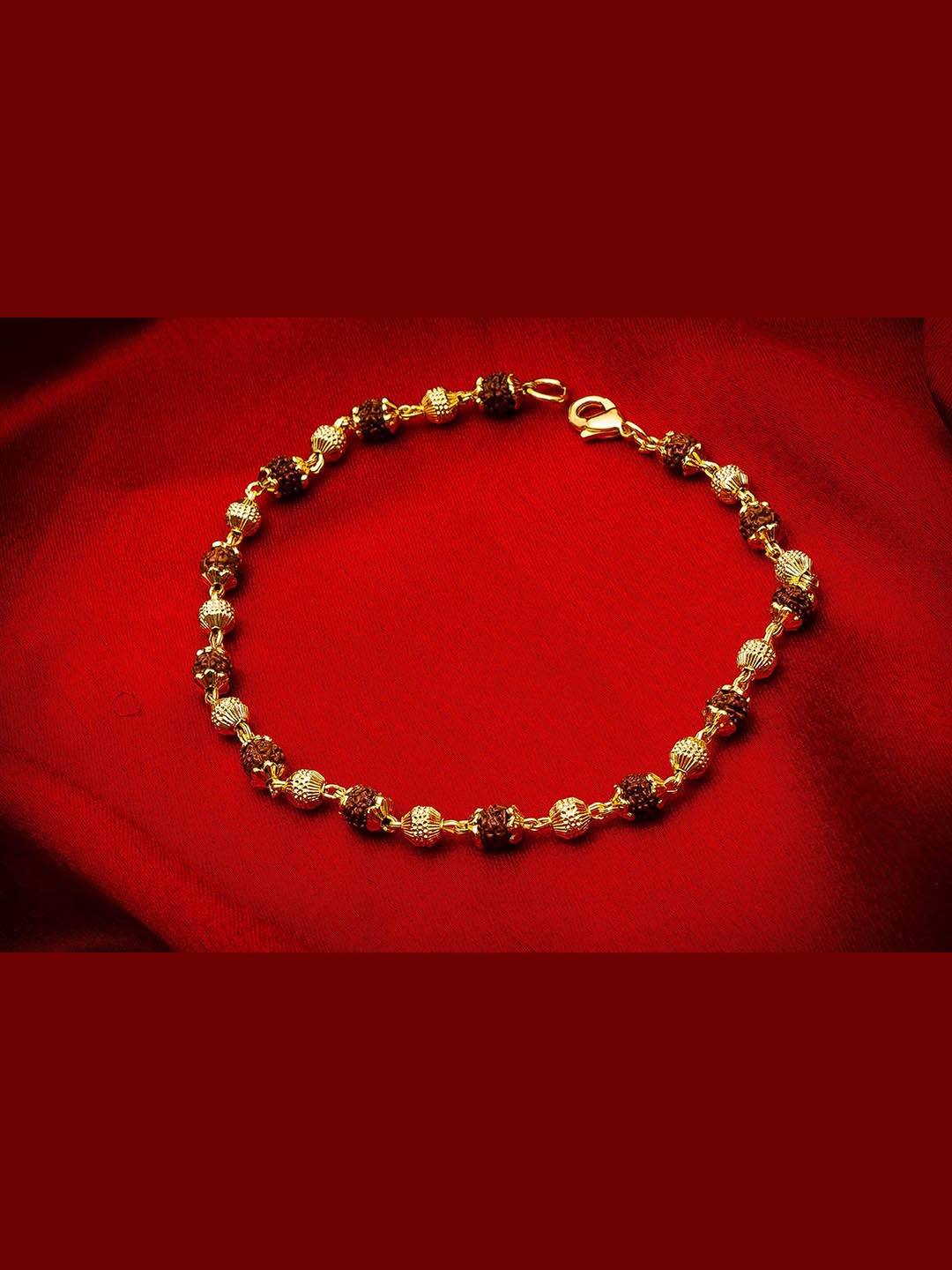 

aadita Gold-Toned & Brown Bracelet Rakhi