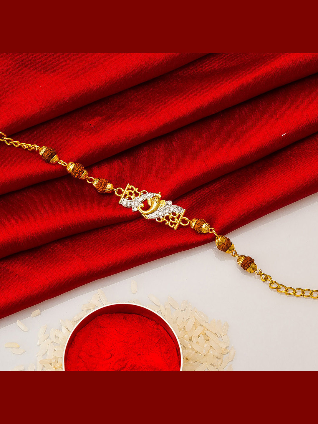

aadita Men Gold-Toned & White Stone-Studded Ganesha Handmade Rakhi