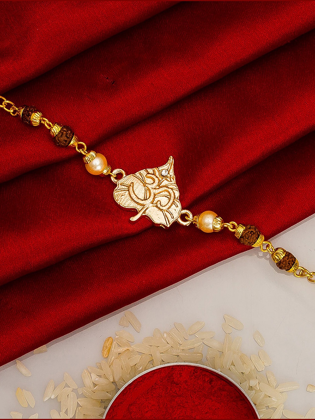 

aadita Men Gold-Toned Bracelet Style Rakhi with Roli Chawal