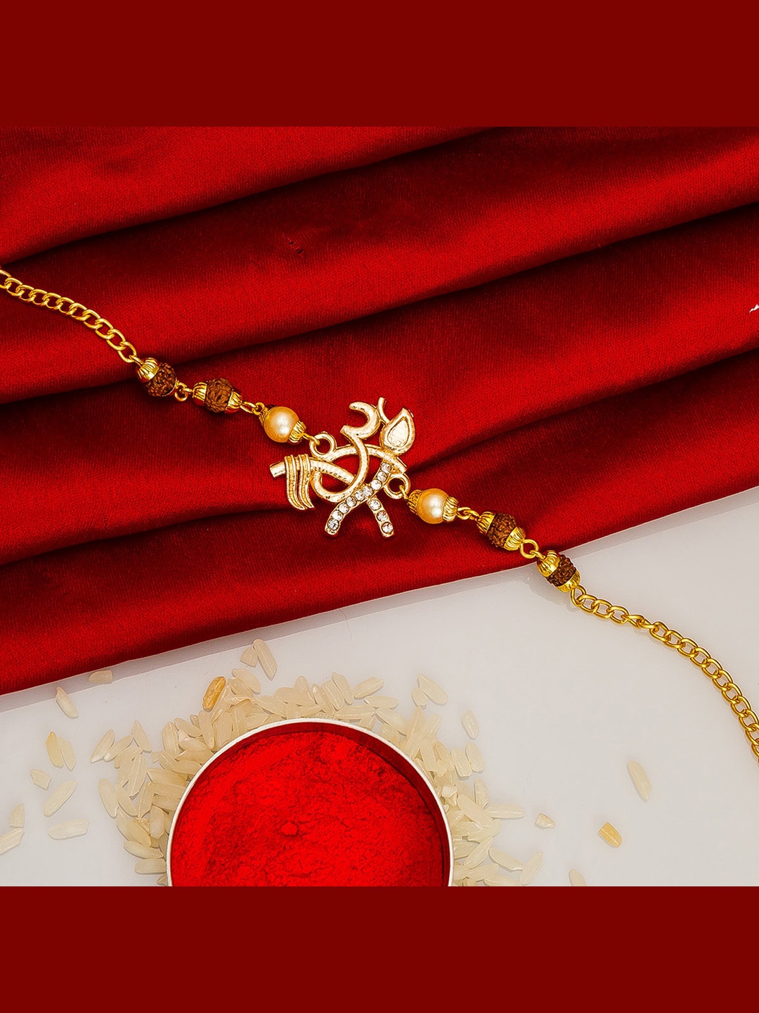 

Aadita Gold-Toned Stone-Studded Bracelet Style Rakhi