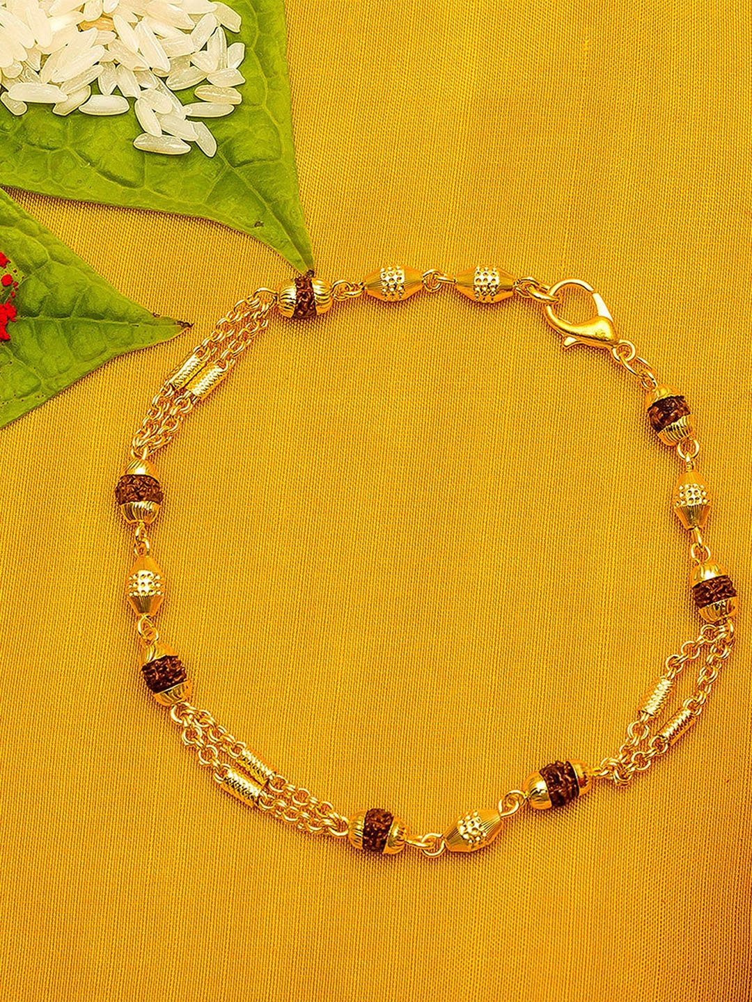 

aadita Men Gold-Toned Bracelet Rakhi With Roli Chawal
