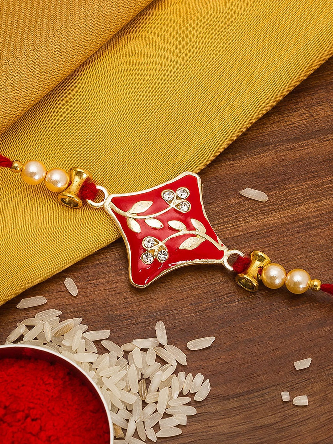 Aadita Gold-Toned & Red Stones Rakhi