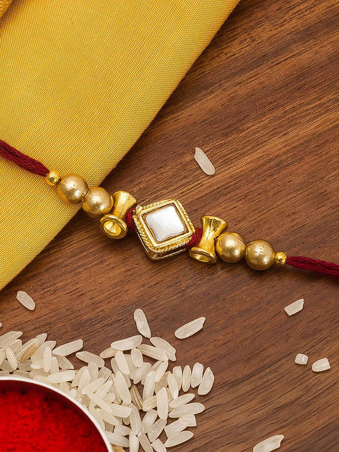 

aadita Men Gold-Toned Stones String Handmade Rakhi