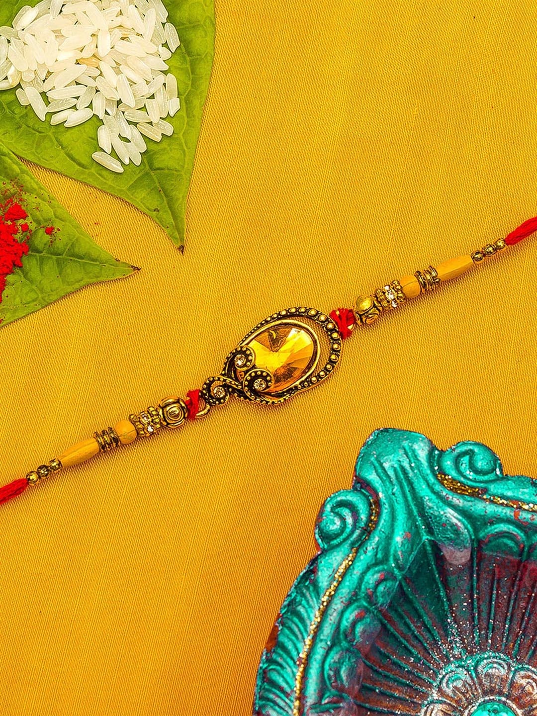 

aadita Men Gold-Toned & White Stone-Studded Handmade Rakhi