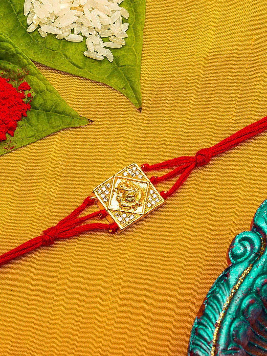 

Aadita Red & Gold-Toned Stone-Studded Thread Rakhi