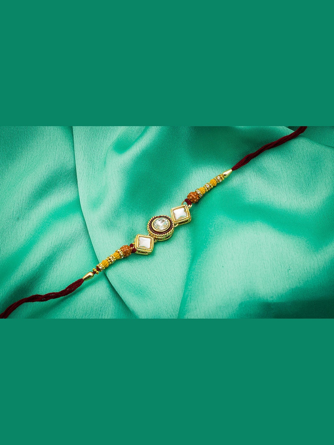 

aadita Gold-Toned & Brown AD Studded Rakhi