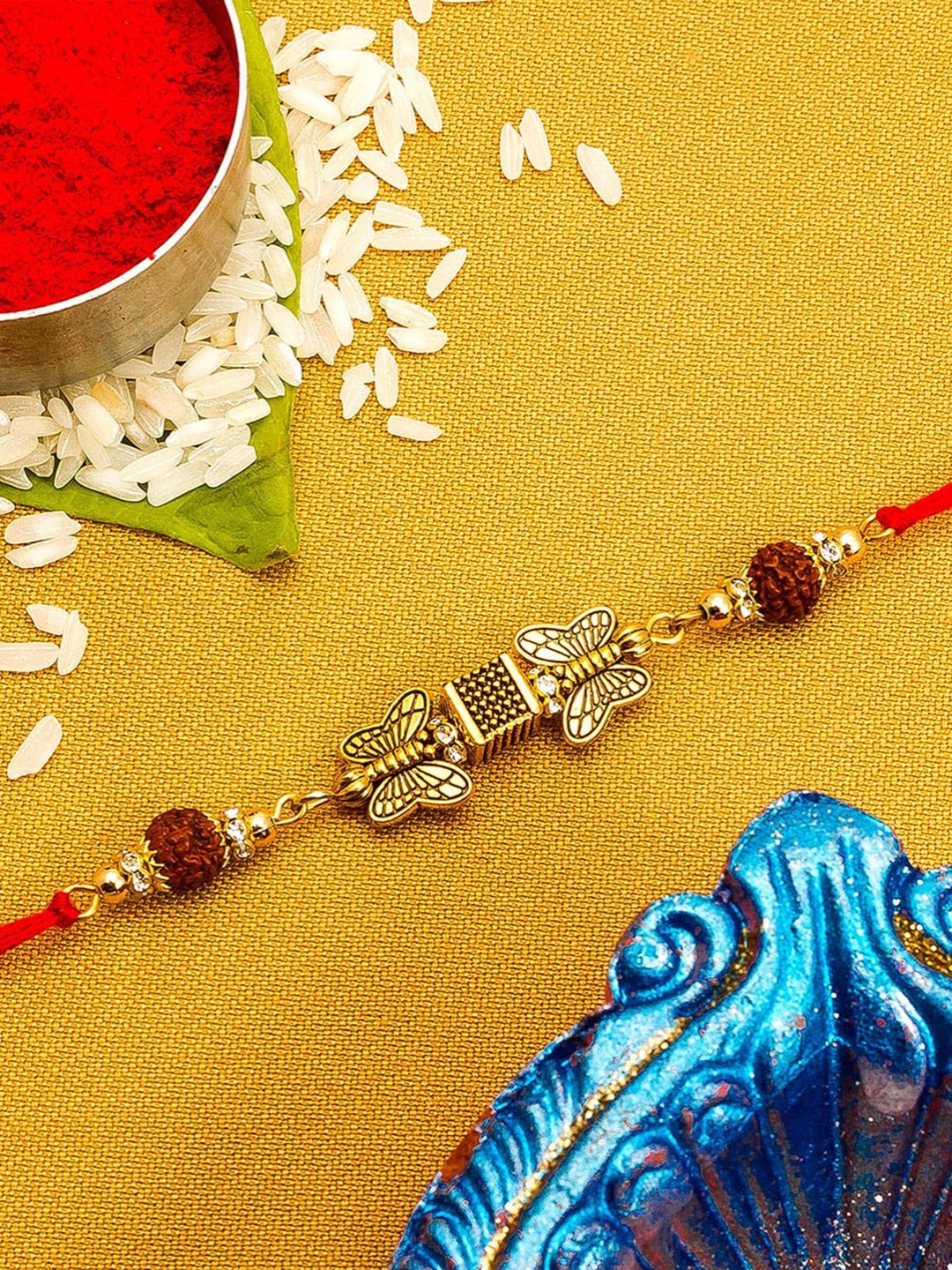 

aadita Gold-Toned Stones String Handmade Rakhi