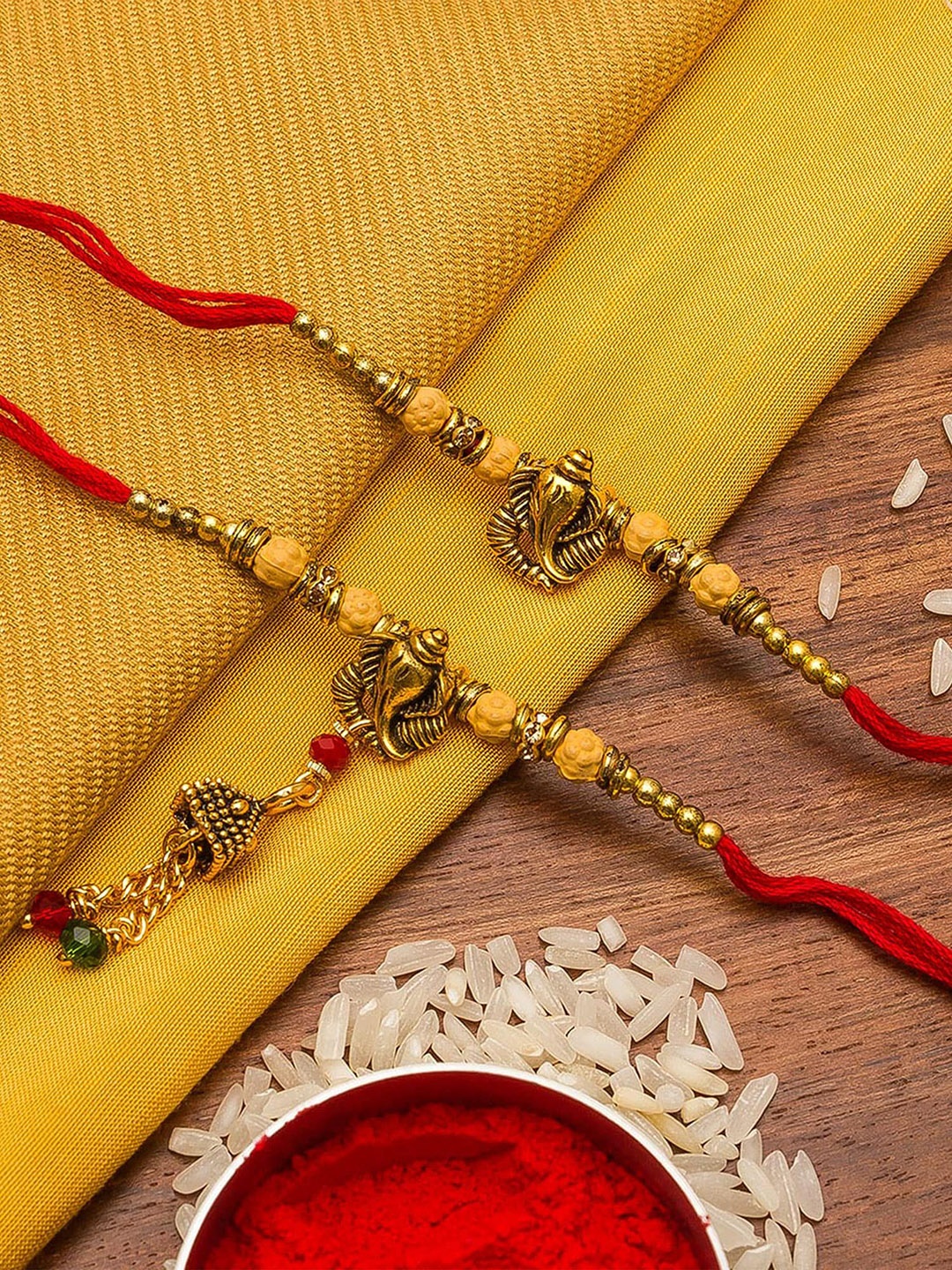 

aadita Set Of 2 Gold-Toned Lord Ganesha Bhaiya Bhabi Rakhi With Roli Chawal