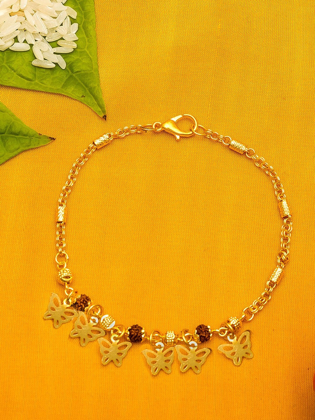 

aadita Men Gold-Toned Butterfly Beaded Rakhi