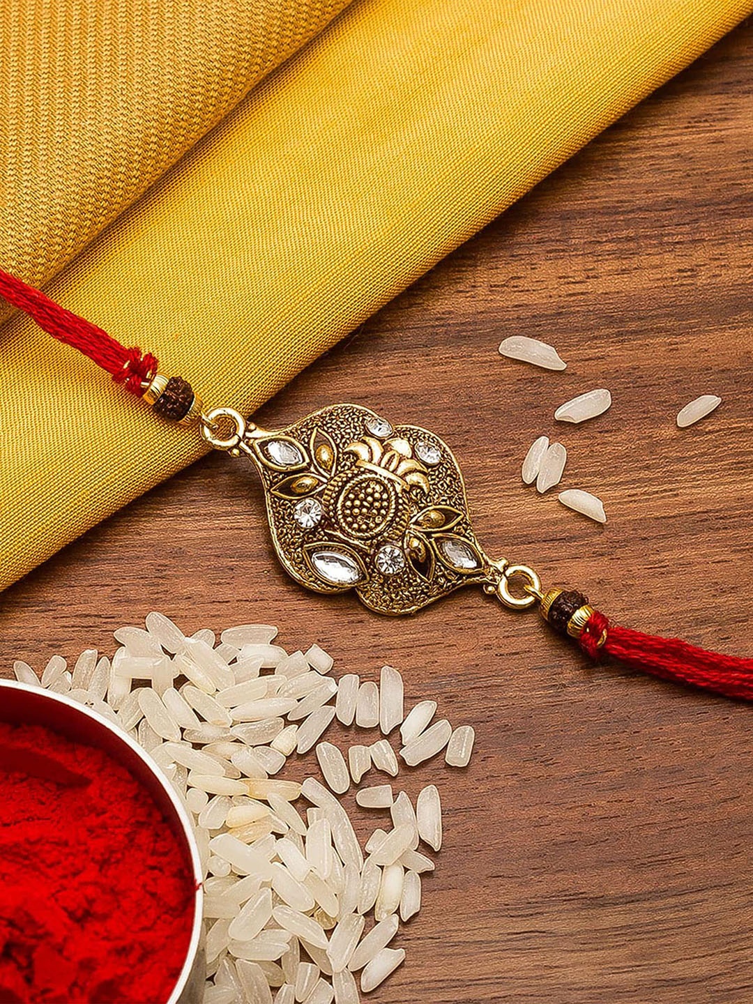

aadita Men Gold-Toned Stones String Handmade Rakhi