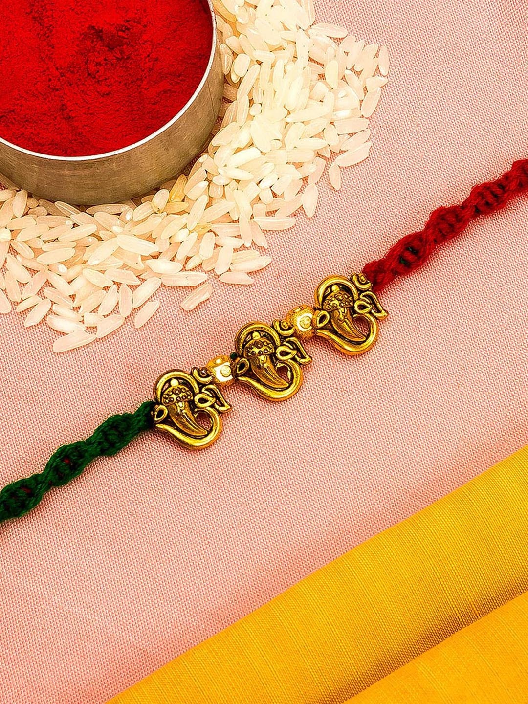 

Aadita Men Gold-Toned Red & Green Beaded Rakhi