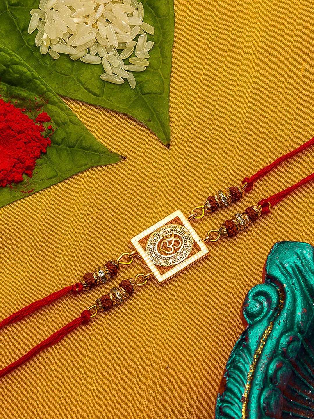 

aadita Gold-Toned & Red AD Studded Rakhi
