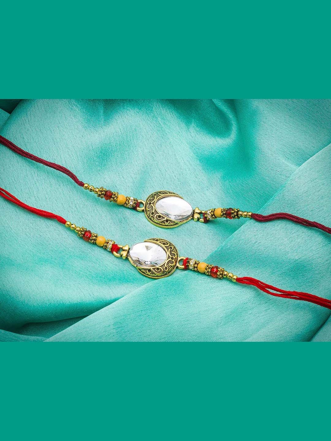 

aadita Set Of 2 Red & Gold-Toned Stone-Studded Thread Rakhis