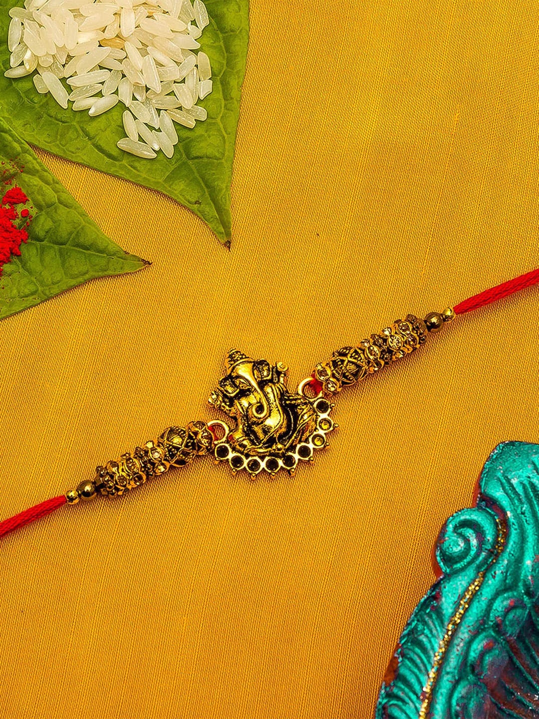 

aadita Men Gold-Toned & Red Stones String Rakhi