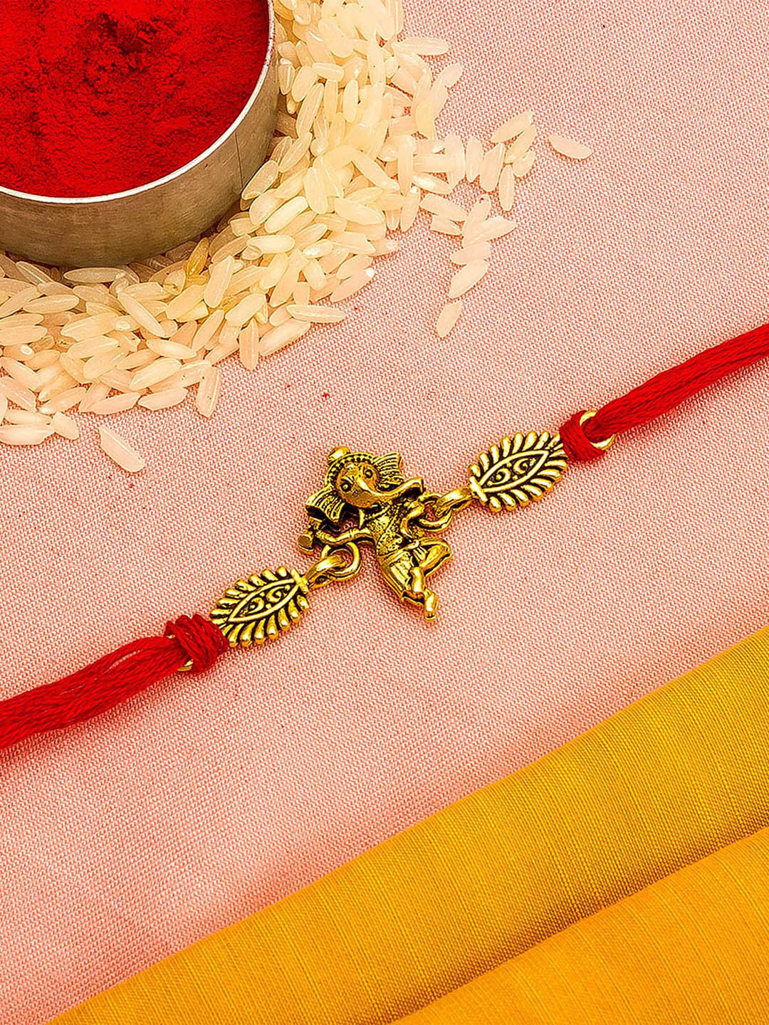 

aadita Men Gold-Colored & Red Ganpati-Studded Handmade Rakhi