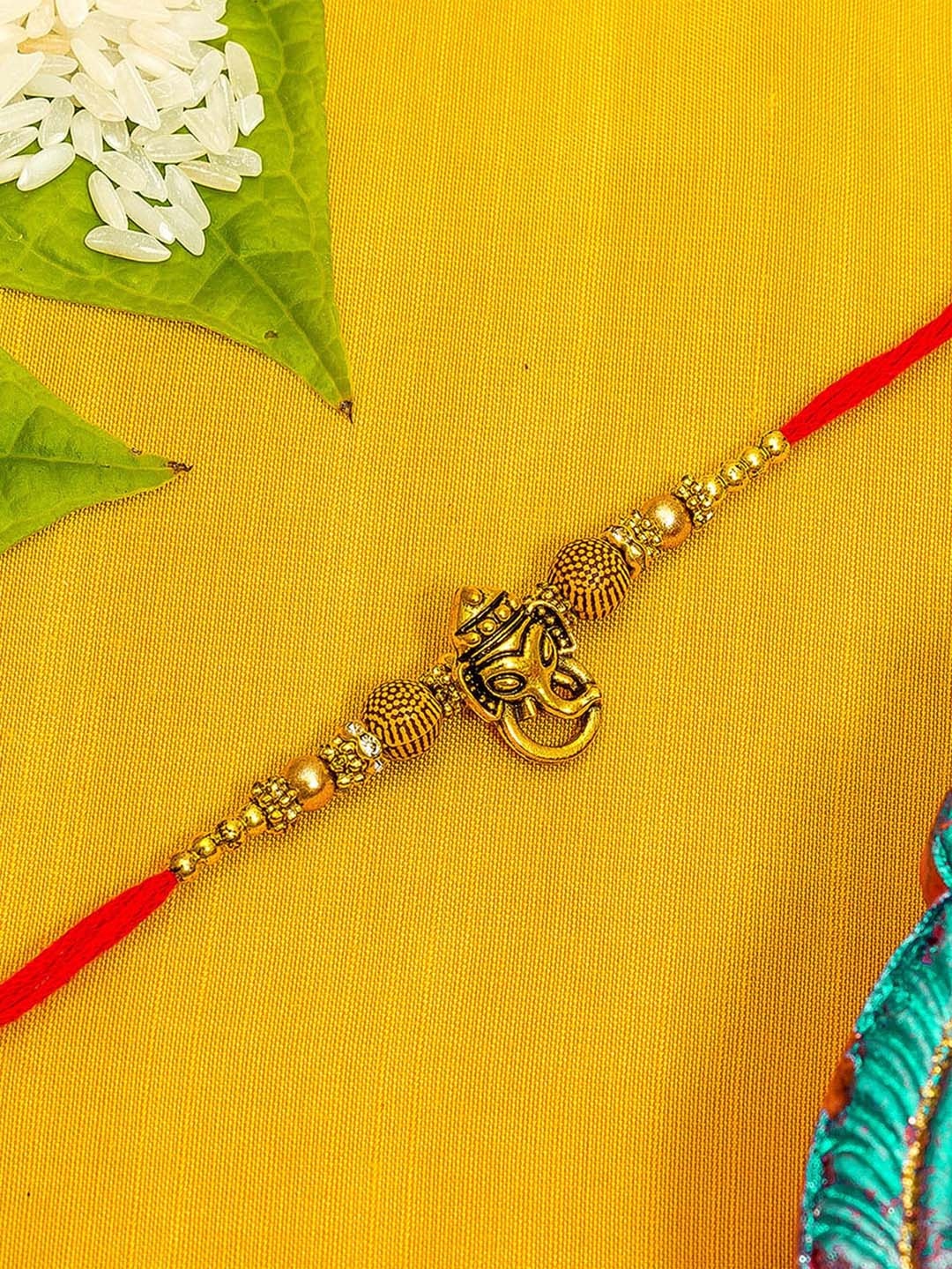 

Aadita Men Red & Gold-Toned Rakhi