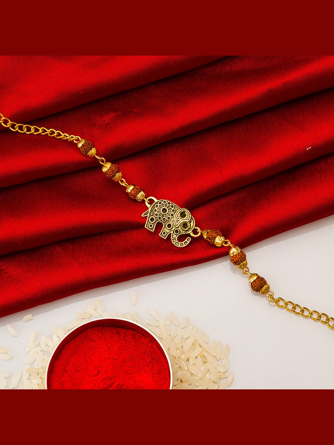 

aadita Men Gold-Toned Elephant Bracelet Rakhi With Roli Chawal
