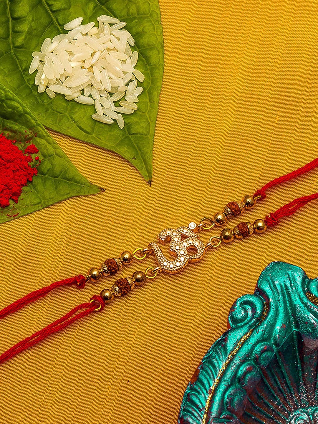 

aadita Men Gold-Toned White AD Studded Rakhi