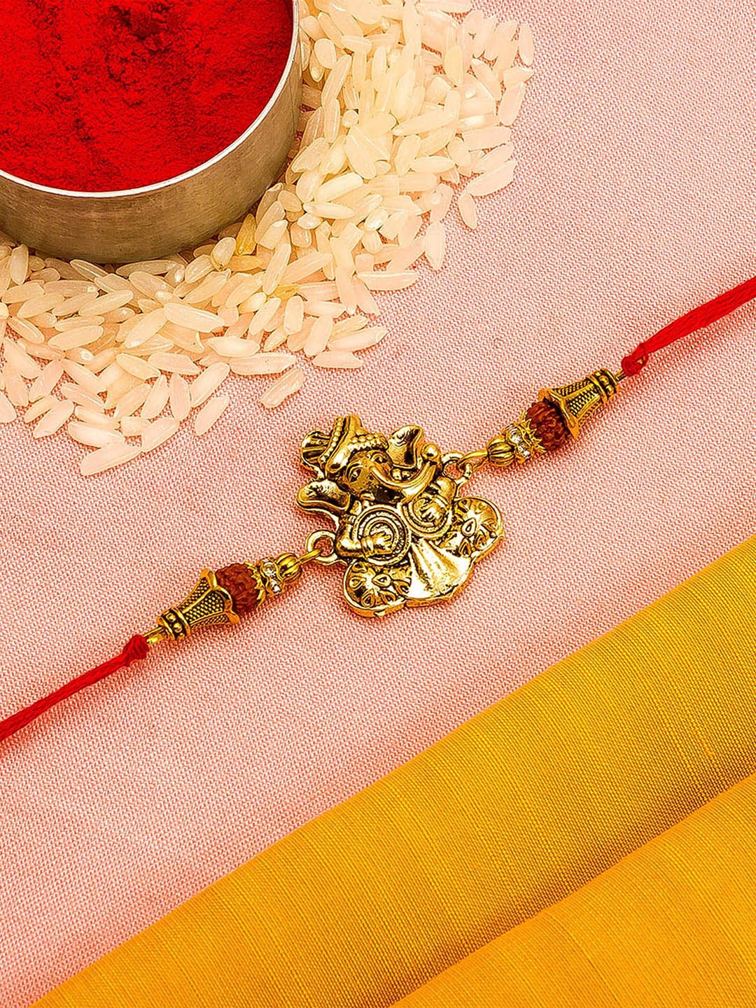 

aadita Men Red & Gold-Toned Stones Rakhi