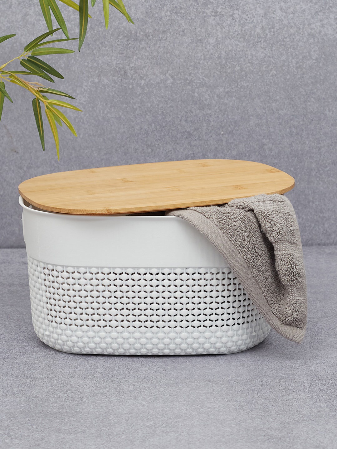 

HomeTown Stereo Plastic Oval Basket With Bamboo Lid 6.5 Ltr in White Colour