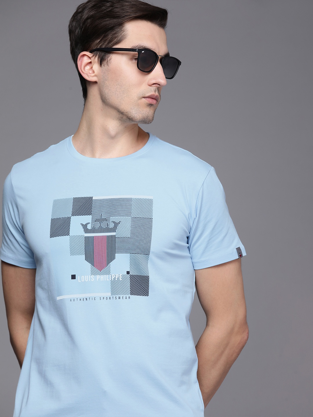 

Louis Philippe Sport Men Blue & White Brand Logo Printed T-shirt