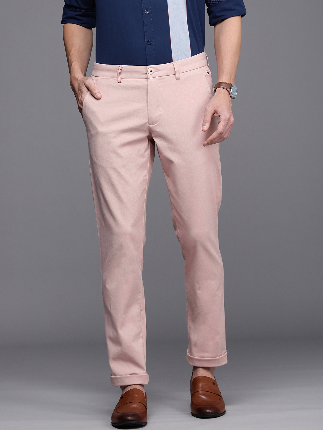 

Louis Philippe Sport Men Pink Self Design Textured Slim Fit Regular Trousers