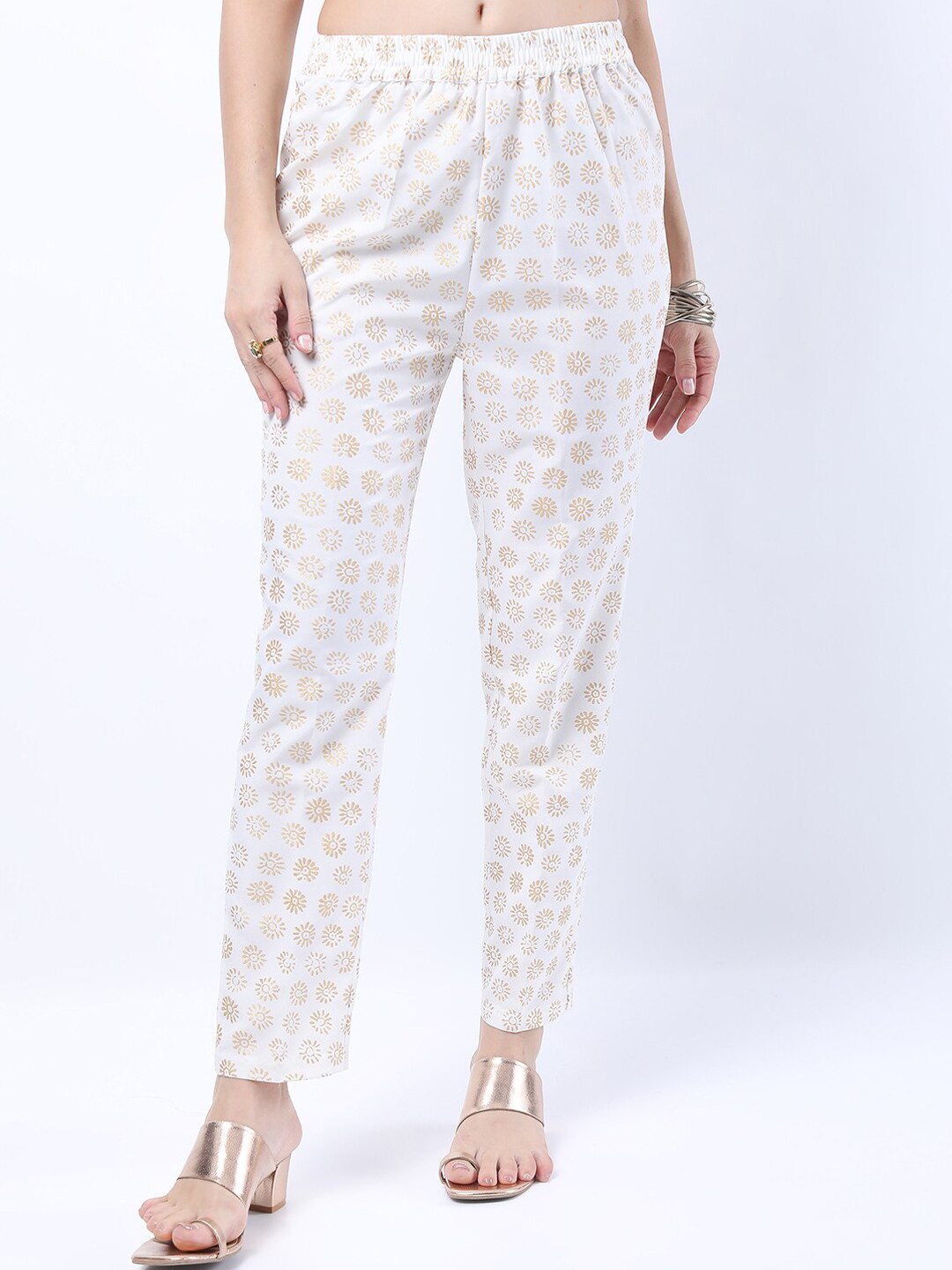 

Vishudh Women Off White Floral Printed Slim Fit Trousers