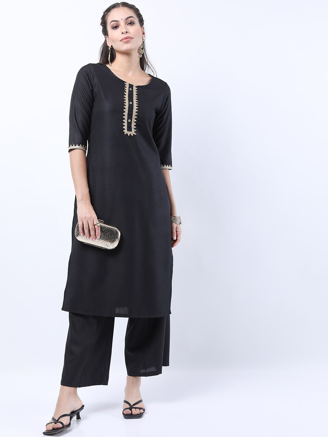 

Vishudh Women Black straight Kurta with palazzo