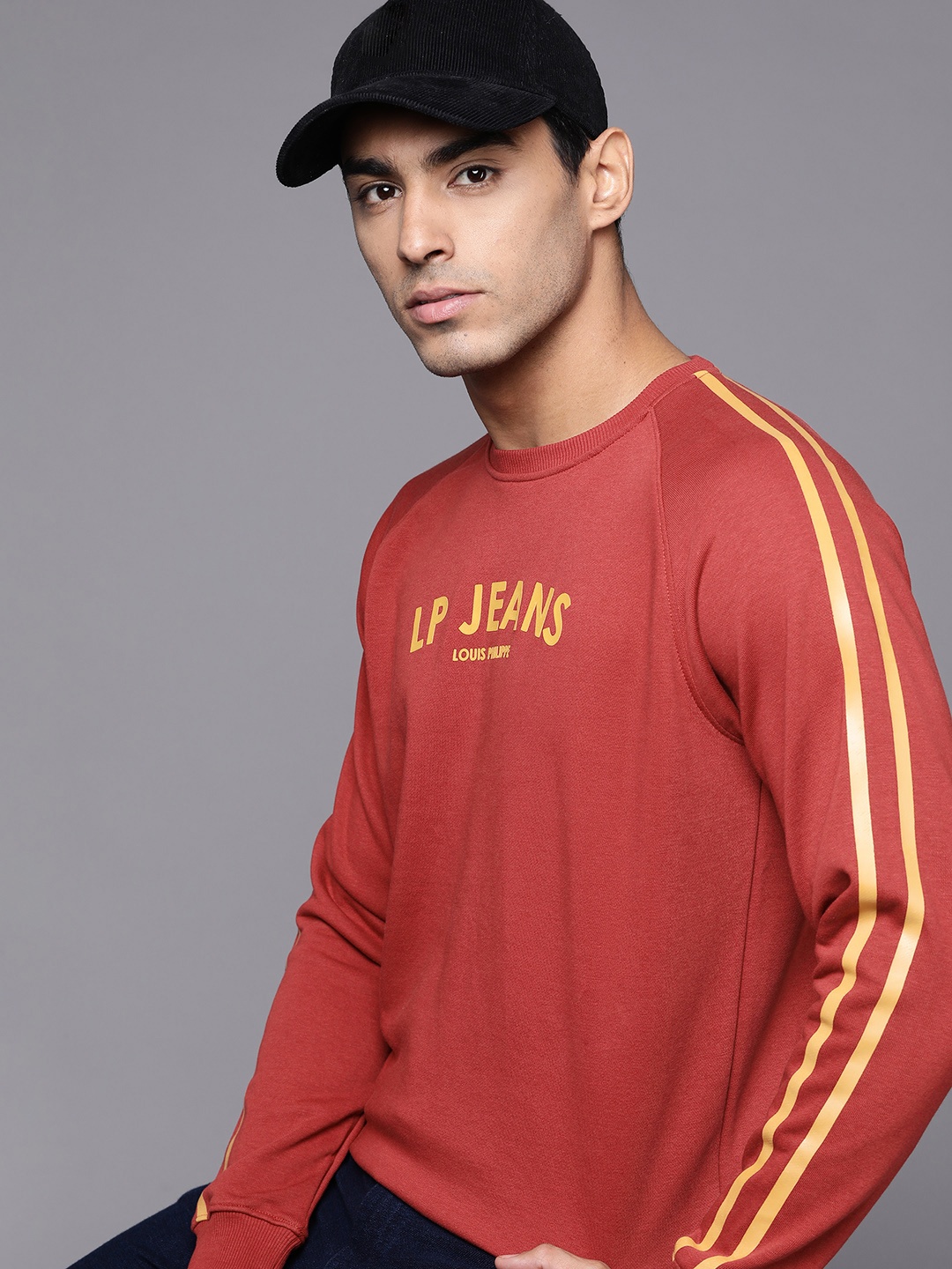 

Louis Philippe Jeans Men Rust Red & Yellow Brand Logo Printed Sweatshirt